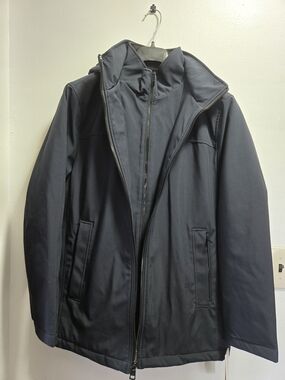 Calvin Klein Men's Infinite Stretch Jacket featuring a polar fleece